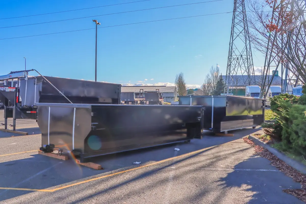 Roll-off dumpster ready for waste disposal at job site for Construction Dumpster Rental in Oakwood